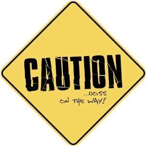   CAUTION  DOSS ON THE WAY  CROSSING SIGN