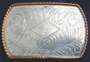 COMSTOCK WESTERN STERLING HAND ENGRAVED BUCKLE  