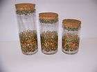 CIRCA 1960s 3pc. GLASS CANISTER SET WITH CORK LIDS