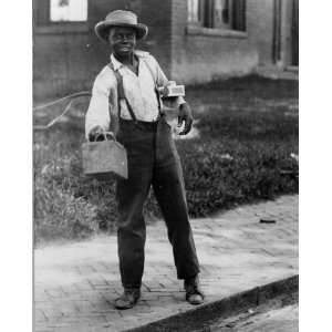 1899 photo African American boy holding out shoe shine box 