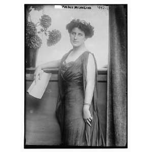  Mrs. Inez Milholland posing with scroll of paper 1910