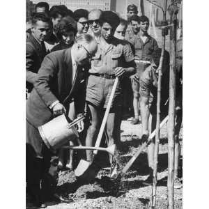  President Habib Bounguila of Tunisia Watering a Tree 