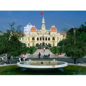  Riding Bikes Past Fountain and Town Hall, Ho Chi Minh City, Ho Chi 
