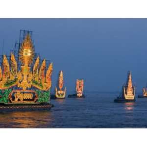 Cambodias Illuminated Boats Make Their Way Along the Tonle Sap River 