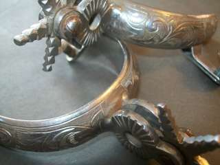 vintage spurs and halter western with silver overlay  