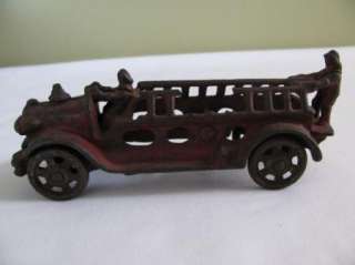 Vintage Arcade Cast Iron Fire Truck, hook and ladder style.