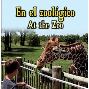  At The Zoo Bilingual Board Book