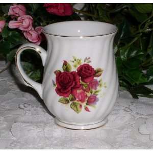  Set of six rose porcelain 8 oz mugs.