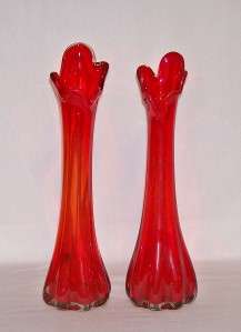   OF CASED TANGERINE COLORED GLASS PULLED OR SWUNG GLASS VASES  