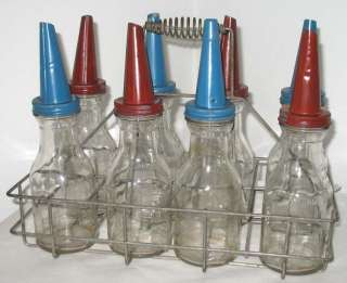 Set of 8 matched Huffman Glass Automotive Oil Bottles in original rack 