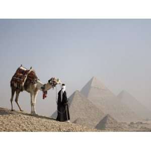  Bedouin Guide with His Camel, Overlooking the Pyramids of 