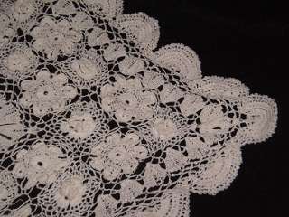 This lovely table cloth was hand crochet from white linen threads 