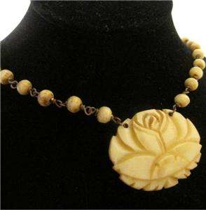 Vintage, carved rose pendant, beaded necklace in a faux bone 