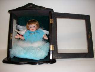 ASHLEY BELL BABY DOLL IN WOOD CASE COLLECTABLE HOLDING A BIRD WITH 