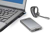 Nehmen Sie über das Voyager Pro UC Mobiltelefon  und PC Softphone 