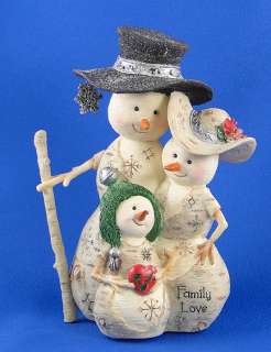 Designed by artist, Barbara McDonald, this group of snow people 