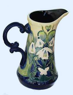This beautiful jug Vase stands 19 cms tall This is a collector item 