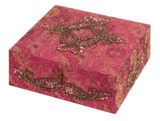 Decorative jewelry box is covered in fine blue fabric and embellished 