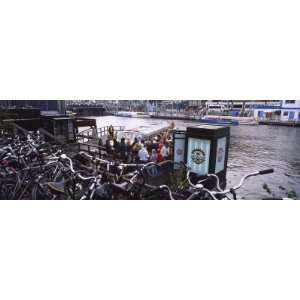 Bicycles Parked Next to a Channel, Amsterdam, Netherlands Photographic 
