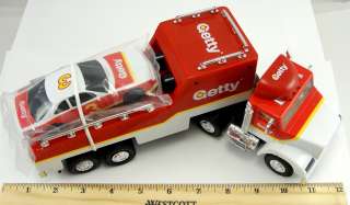   BP Aerial Fire Truck Getty Race Car Carrier & Car Dunkin Donuts  