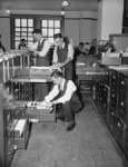   1937 Clerks at the Reconstruction Finance Corporation checking records