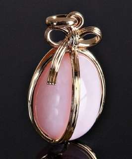 Tiffany & Co. Jean Schlumberger gold ribbon and pink opal egg pendant 